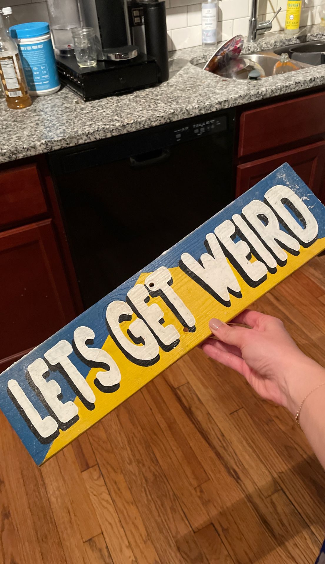 Hand drawn let’s get weird sign