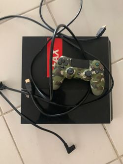 PlayStation 4 (PS4) + Controller + Cables – Great Condition