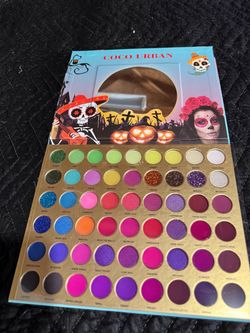 Eyeshadow, palette makeup sponges, eyeliner glue and mirrors