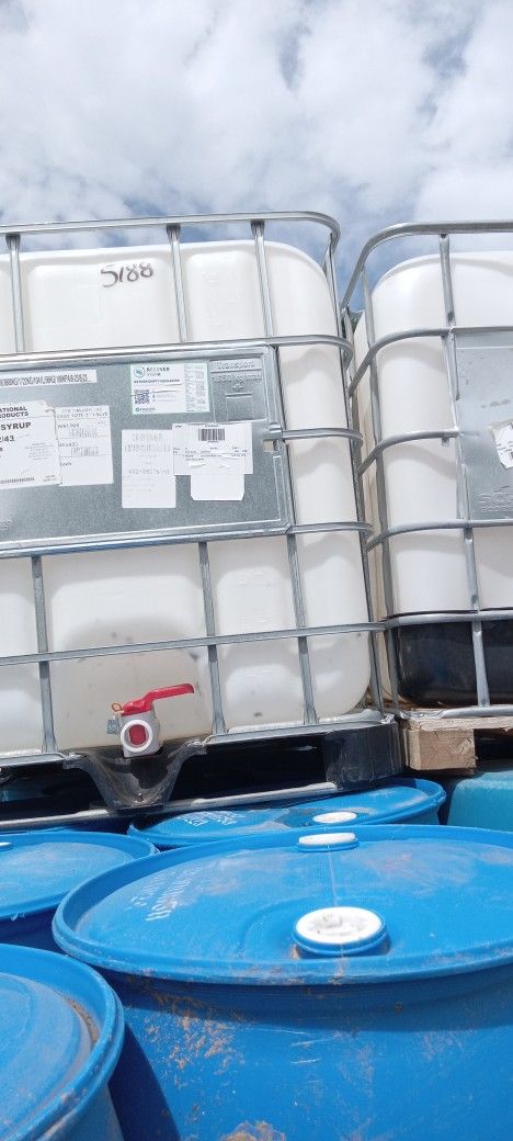 Totes 275$80 And Blue Barrels 55 Gallons $15