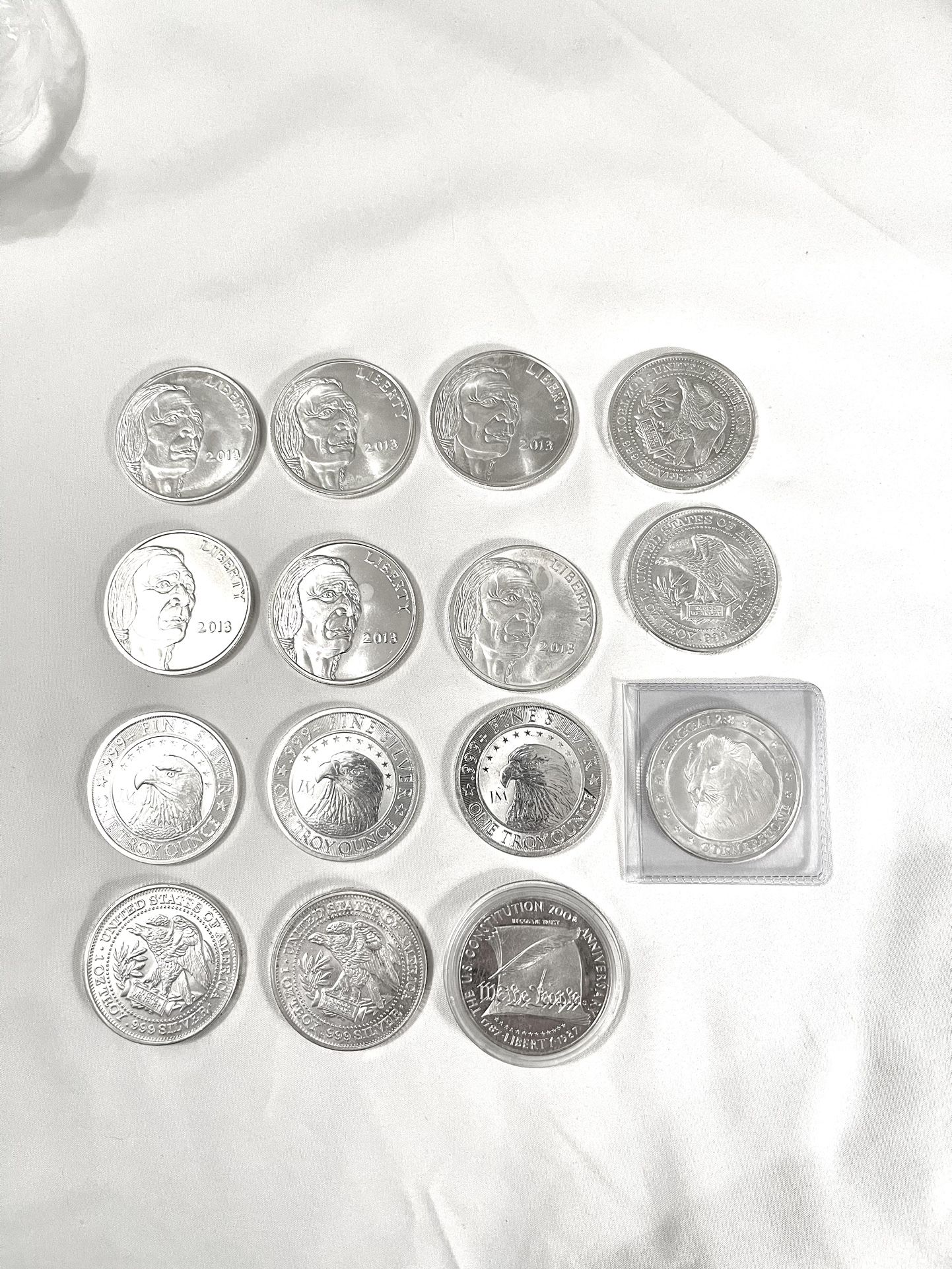 In Great Condition (14) .999 Fine Silver 1 Troy Oz Each Different Designs Silver Rounds & 1987 Issue “We The People” Liberty Silver Dollar Proof