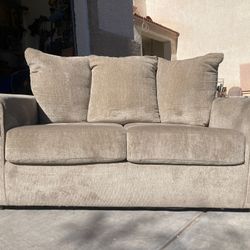 New Loveseat By Ashley 