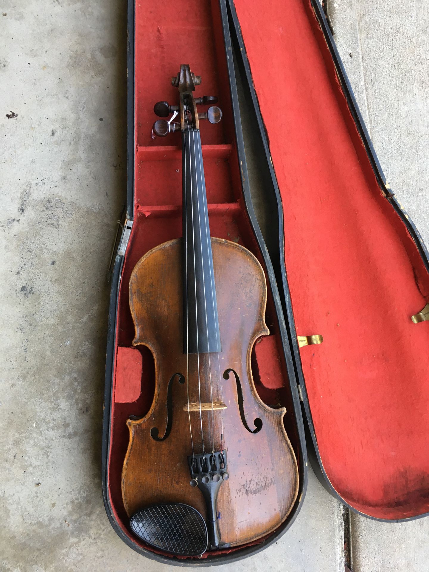 old violin in case with bow