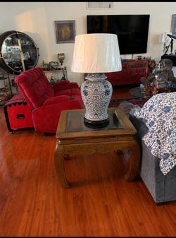 Pair of solid wood Ming Dynasty style end tables. Very heavy and well made with a timeless design. Each measures 28” W × 24” D × 21” H. Selling the pa