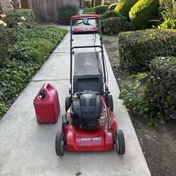 Troy-Bilt Lawn Mower And Gas Container
