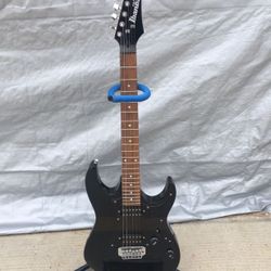 Black Guitar With Stand
