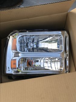 05-07 Ford Excursion, F-250, F-350 one piece headlights.