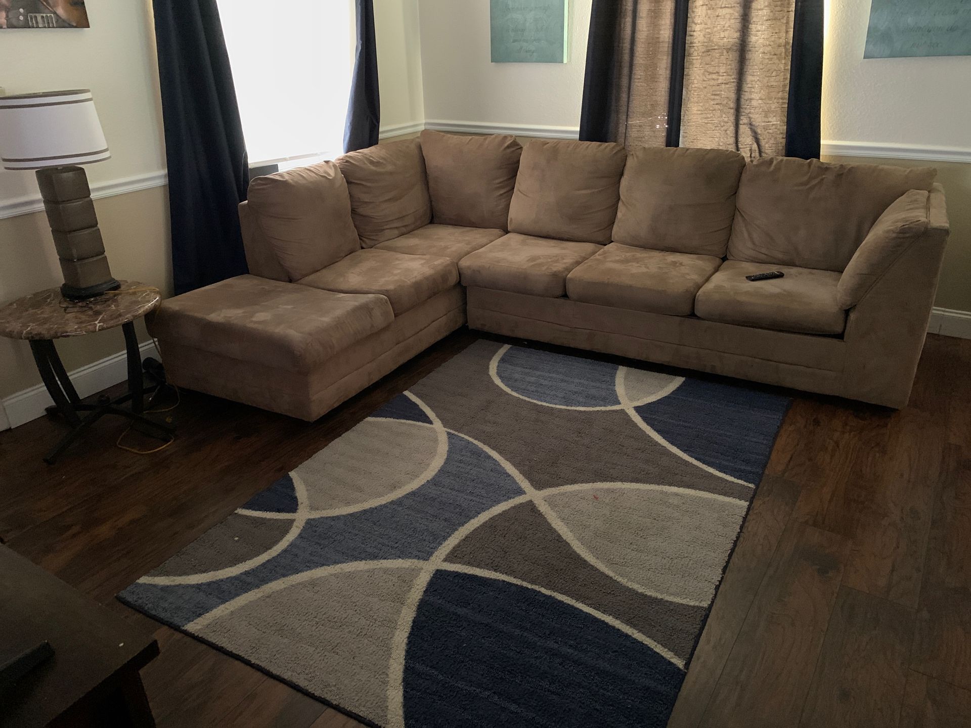 Sectional couch and rug