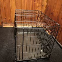 Collapsable metal dog crate with comfort platform