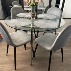 Glass Dining Table Four Gray Velvet Chairs