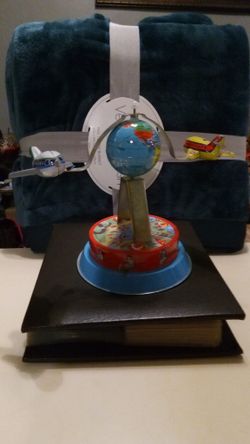 Spinning, Wind-up Metal Toy