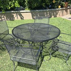 Wrought iron table and chairs