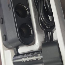 12v Cigarette Splitter. Has Spots For 3 12v Cigarette Outlet And 2 USB Ports.