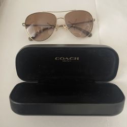 Woman’s Coach Aviator sunglasses 