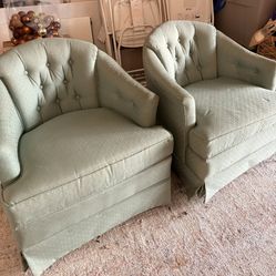 Matching seafood green vintage swivel armchairs