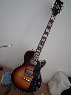 Kay. EFFECTOR..70s Japanese les paul w built in effects...Retro vibe....Japanese craftsmanship....$325