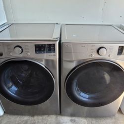 NEW LG ThinQ Front Loading Washer And NEW LG Stackable Gas Dryer Set In Graphite Steel 