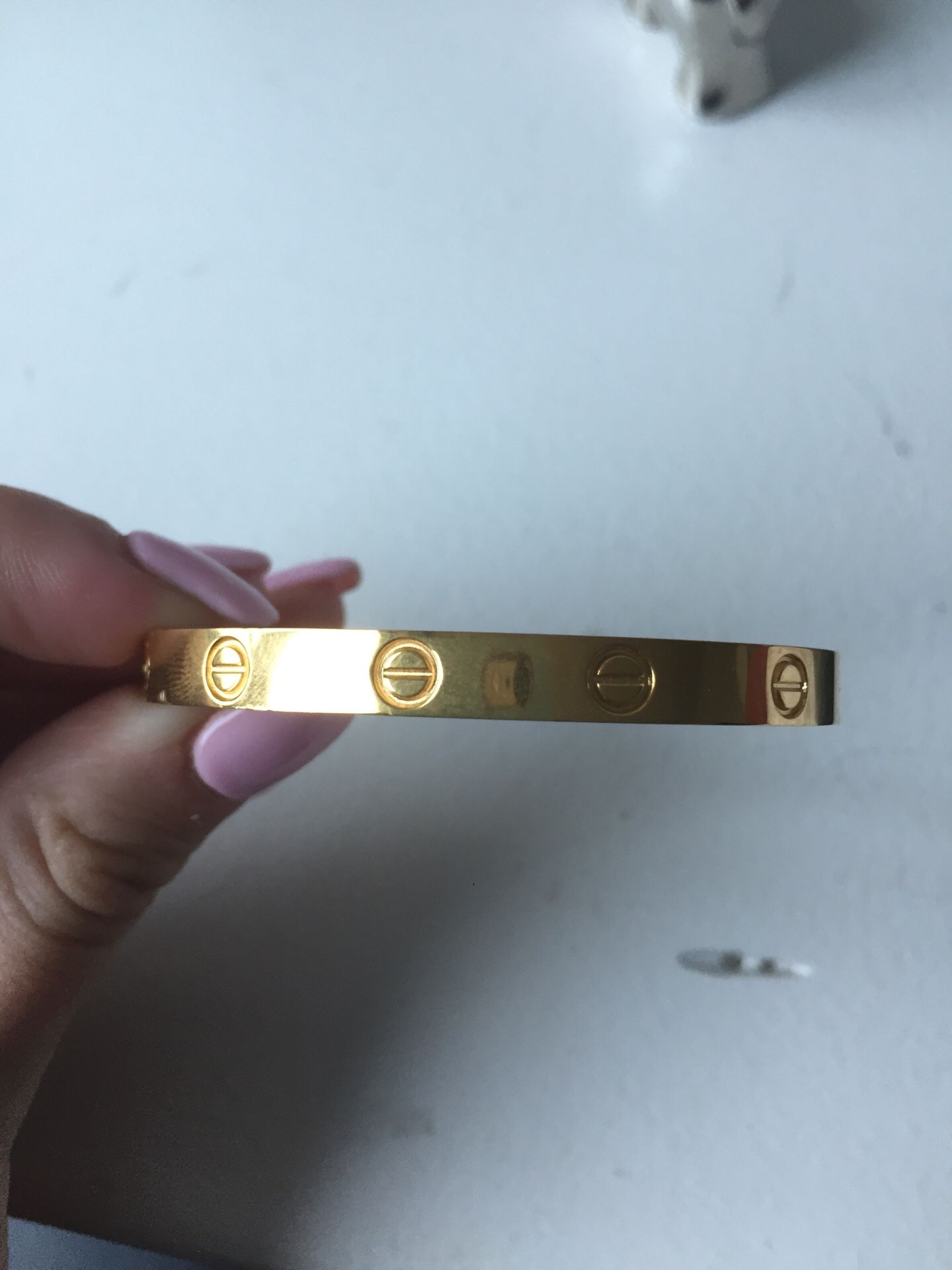Gold cartier love bracelet size 16