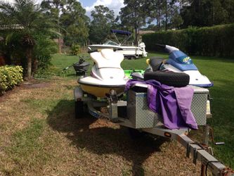 2 Sea Doo jet ski and trailers