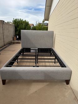 Queen upholstered bed frame + metal foundation