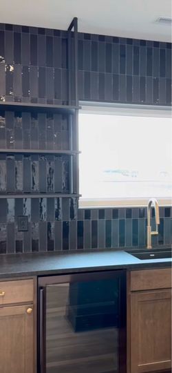 Black subway tile backsplash