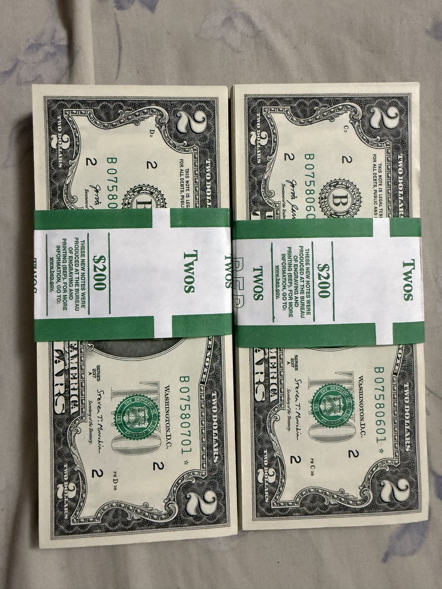 Up For Sale - 2 Full Unc Serial Strap Star Note $2