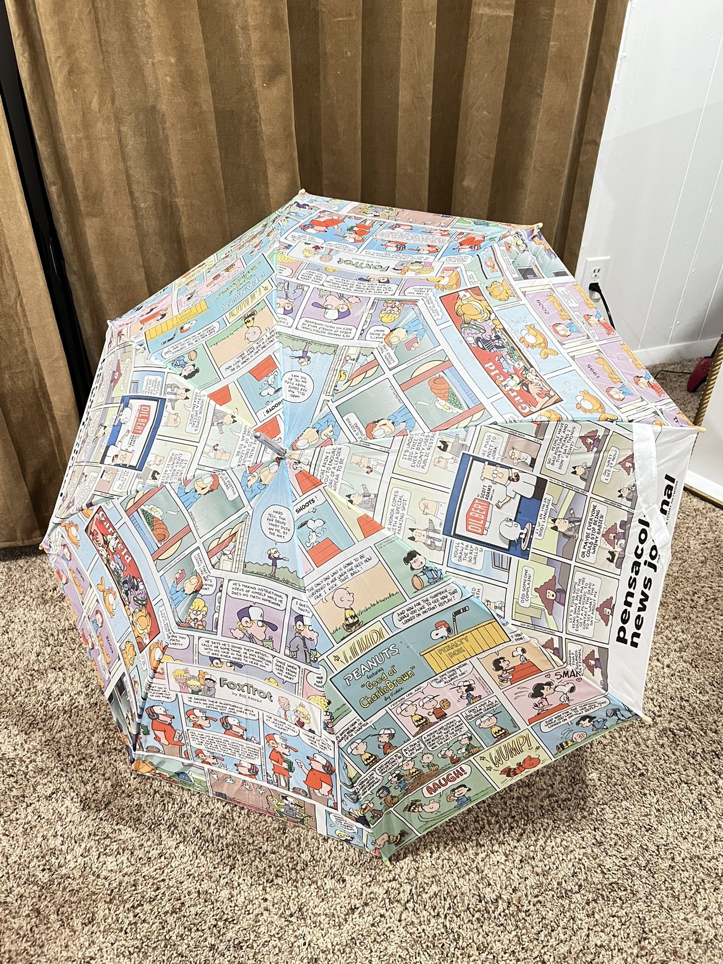 Umbrella newspaper promotions comics pensacola news journal