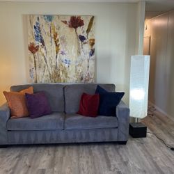 Couch, Lamps, Pillows, Art