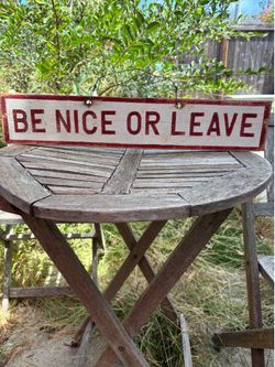 Be Nice or Leave sign