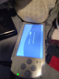 PSP-2000 model, also known as the PSP Slim & Lite, which is a revision of the original PlayStation Portable. This model introduced several key improve