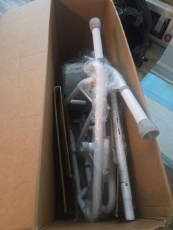 Steel drop arm commode