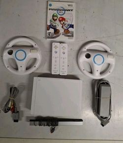 WII complete With Mario Kart And 2 Wheels