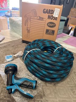 100’ None expanding garden hose W 10 spray nozzle