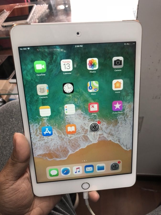 Apple iPad mini 4th Gen 128gb WiFi + cellular