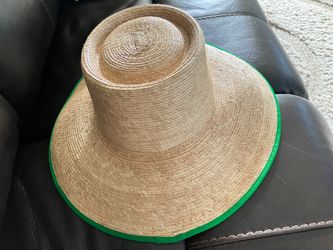 Custom handmade by Jose Albanado natural palm leaves with stylish green trim.