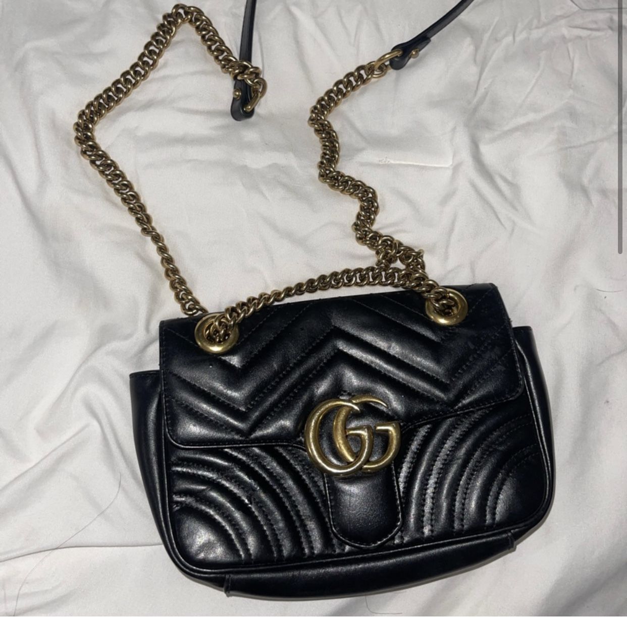 GG Marmont matelassé mini bag black and gold