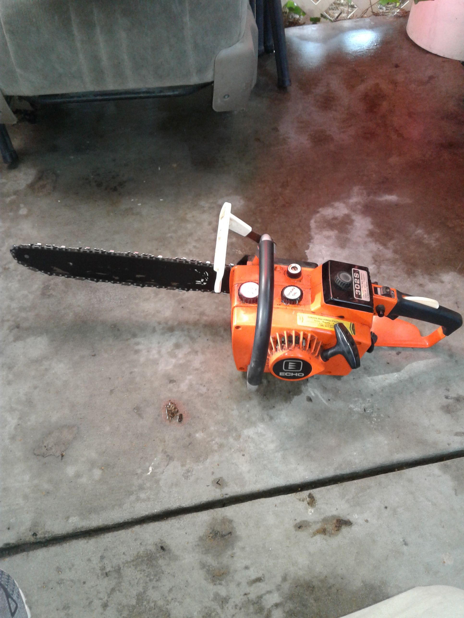 Echo krioritz 302s chainsaw, running.