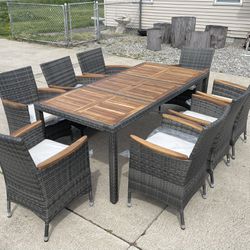 BRAND NEW Outdoor patio furniture dining set large table with 8 grey wicker dining chairs & cushions