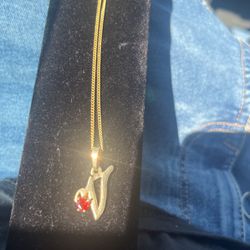 Gold Necklace With A Ruby Heart 