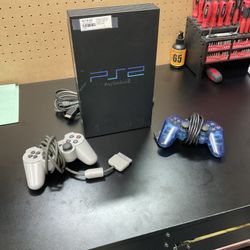 PS2 (w/ cables & 2 controllers)