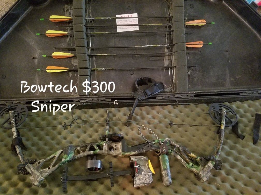 Bowtech sniper bow and arrows