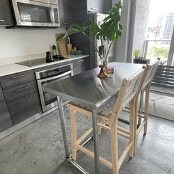 Stainless Steel Bar Table and Wooden and Leather Strap Bar Chairs 