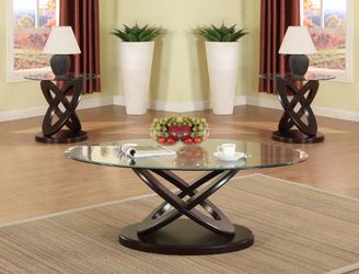 Brand new 48" x 26" oval glass coffee table with wood base, end table is extra