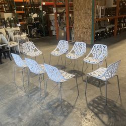 Two Sets Of 4 Modern White Plastic And Metal Dining Chairs (8 Total)