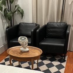 Two Faux Leather Chairs