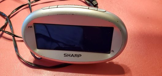 Sharp snooze alarm clock