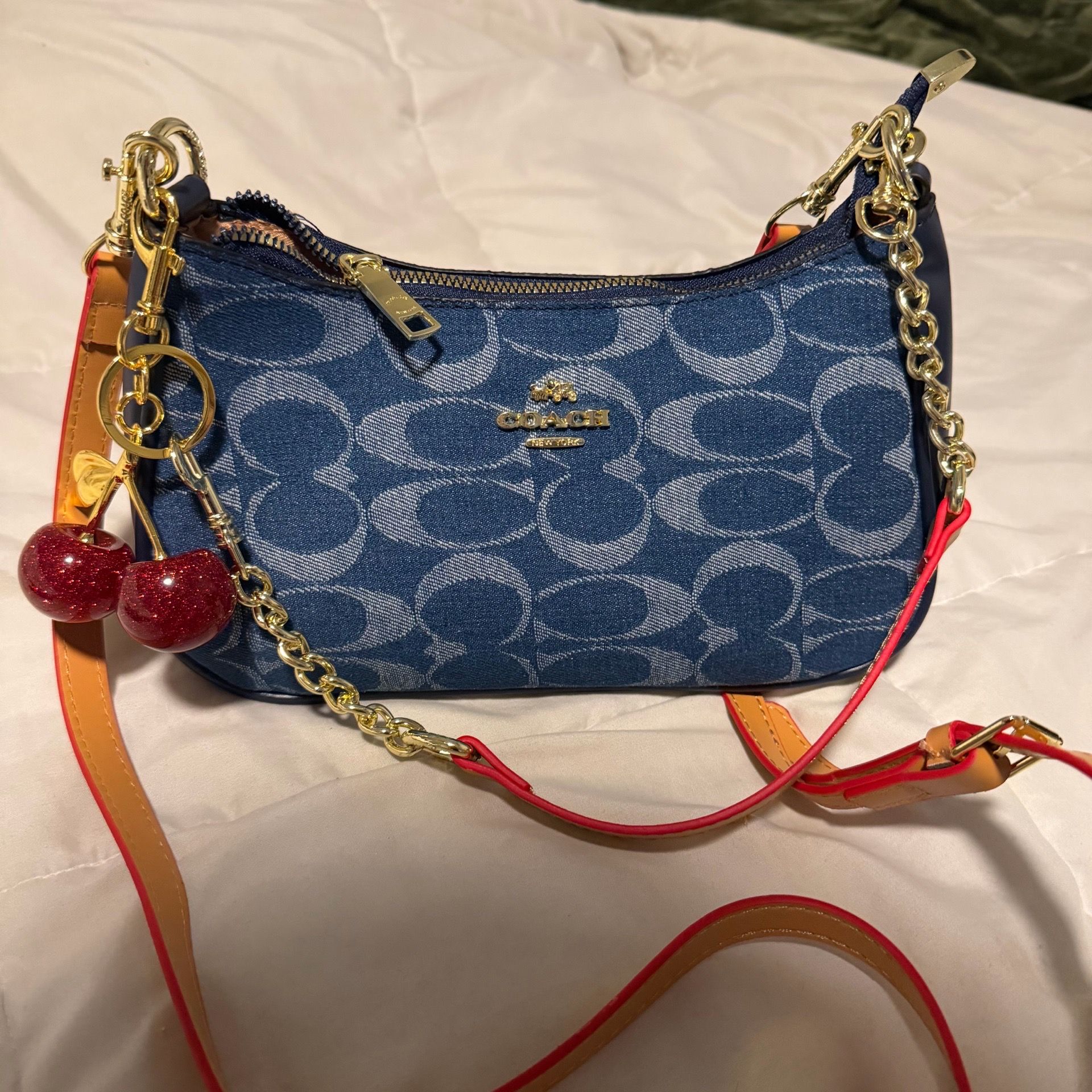 denim coach purse