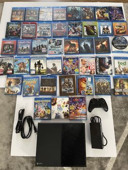 Xbox one console with one controller and 40 blue ray movies