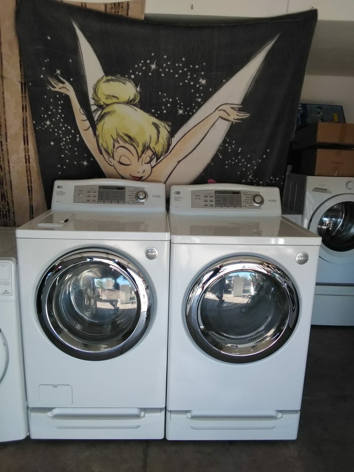 LG TROMM WASHER AND ELECTRIC DRYER WITH PEDESTALS