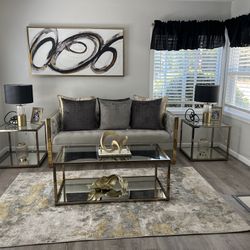 Two piece sofa and chair with three piece, coffee table and Two End Tables